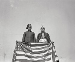 "Almas director." Officials of Almas, the Washington D.C., Masonic temple, at the Shriners Convention of June 1923, which hosted a quarter-million delegates from lodges and temples across the United States. Imperial Potentate James McCandless and President Warren Harding, himself a Master Mason, were among the dignitaries present for a week of parades along Pennsylvania Avenue, which was strung with thousands of electric lights and rechristened the "Road to Mecca" at a time when interest in fraternal organizations was at its peak. View full size.