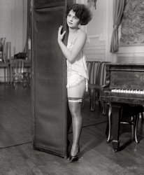 Washington, D.C., circa 1923. "Lucille Layton." Whose talents, to judge from her photographic oeuvre, seems to have been at least peripherally related to the piano. National Photo Company Collection glass negative. View full size.