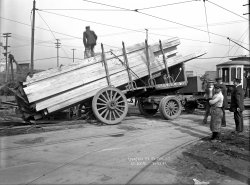 October 21, 1914. Bronx, New York. A Cross, Austin, & Ireland Lumber Co. truck accident on the trolley tracks at East 138th Street and Southern (now Bruckner) Boulevard. 8x10 inch glass negative. View full size.
