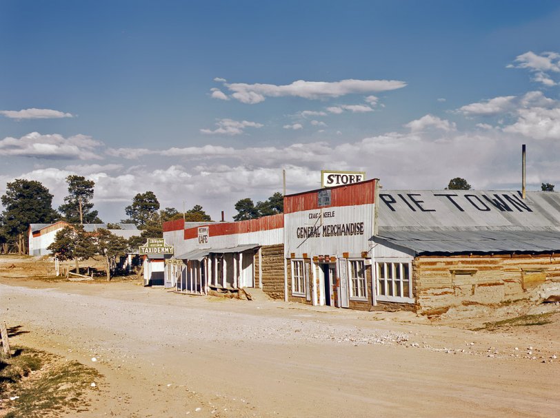 October 1940. "General Merchandise store, Main Street, Pie Town, New Mexico." View full size. 4x5 Kodachrome transparency by Russell Lee.
