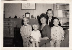 Brother Stephen, sister Susie, Mom Nancy, Dad Jack and me. Photo taken mid-1966 in Bellevue, WA, shortly before dad shipped off to Vietnam (the only tour of duty we weren't allowed to accompany him on; we lived in a lot of different places while us kids were growing up).
Picture taken by my grandfather John Lagsdin, who had been a publicity photographer in Hollywood. I remember seeing stills he took for Rory Calhoun, and I'm told he was the photographer at Boris Karloff's daughter's wedding. View full size.
Thank youMom made all the clothes in that picture (except for dad's suit). I was indeed a very lucky boy to have that family.
Beautiful FamilyYour family is great! Love the boys jackets. You are so lucky to have had a great involved dad, especially in the '60s.
Something in commonHad your dad moved his family to Bellevue to be near your mother's family while he was gone? My dad served two tours in Vietnam. He came back changed, but in one piece, and is still with us at 82. I hope yours did, too. There were some things that were very unique about that war, especially the way our servicemen tended to be treated upon returning. 
(ShorpyBlog, Member Gallery)