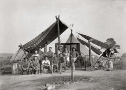 Circa 1914. "U.S. Army camp kitchen." National Photo Co. View full size.