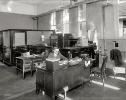 Washington, D.C., circa 1920. "Universal Auto Co., interior." Our second look at this Ford dealership at 1529 M Street. National Photo Co. View full size.