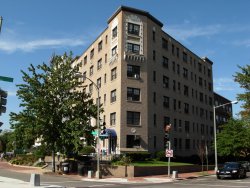 Corner of 3rd and D streets N.E., Washington D.C. in 2008. Former site of  Dr. Thomas Taylor's gothic residence.  The current building was built circa 1930s as the New Haven Apartments.  It now houses offices and street-level retail.  Just down the block to the left (behind the tree) are the main offices of the conservative Heritage Foundation.