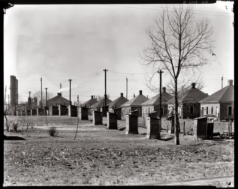 March 1936. "Workers' company houses and outhouses. Republic Steel, Birmingham, Alabama." 8x10 inch nitrate negative by Walker Evans. View full size.