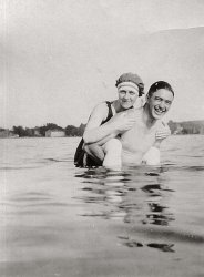 This photo is Part 2 to "The Proposal".  I like to think that this is the happy aftermath after she said 'Yes' (but then where's her ring?).  Wish I knew more about these two pix, especially what body of water they're wading about in...