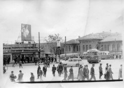 Another photo taken in Turkey 1963 when my dad was stationed there. I am thinking the billboard has to do with the 40th Annivesary of the founding of the modern country related to my previous posting. Though it seems like only men are allowed to mill around town. View full size.