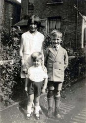 Putney, South London, England, 1934. Betty, Jack and little Ian in the garden of my grandparent's house. My Dad went on to fly B17s for RAF Coastal Command 10-12 years later. He's now the only one of his generation of the family still living. View full size.