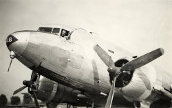 This is a scan of a battered print showing my grandfather in the cockpit of a C-47. My best guess is that this is in the last half of 1944 and in the US per his logbooks, but it could be as late as mid-'45 in Europe. I've recently discovered a stash of his wartime photos and will add more if there's any interest. View full size.