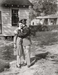 Here is a cute 1940s couple from my Instant Relatives collection.  Not sure if he's leaving or has just come home from duty - am hoping it's the latter.  She seems a lot less enthusiastic about their embrace than he does; hmm, wonder why...