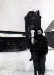 This is a photo of a newlywed young Doris Miller (formerly Lutz), my Grandmother.  This photo was probably taken around 1935 in the small town of Pound, Wisconsin just outside of Peshtigo, Wisconsin.  Notice the dog against the old chicken coop just to the left of the horse.  I love this photo!!