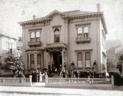 "For Aunt Annie, Compliments of Mayme".

My grandmother had this photo of a boarding house in Los Angeles in her photo collection. I suspect the photo was given to her grandmother, but I never heard any stories about the photo - I first saw the photo long after she died.  Taken by "Mr. B. Howard, View Photographer, 147 South Main St., Los Angeles CAL".

I managed to figure out the location of the house from a few clues in the photo, but I'd be curious what other details folks can gather from it! View full size.