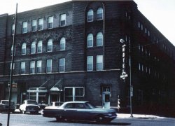 This is the Fairbury, Nebraska hotel where I grew up.  Our apartment was on the top floor in the corner. This picture is from around 1964, about the time my dad started running the place. We ran the cafe, too. View full size.
(ShorpyBlog, Member Gallery)