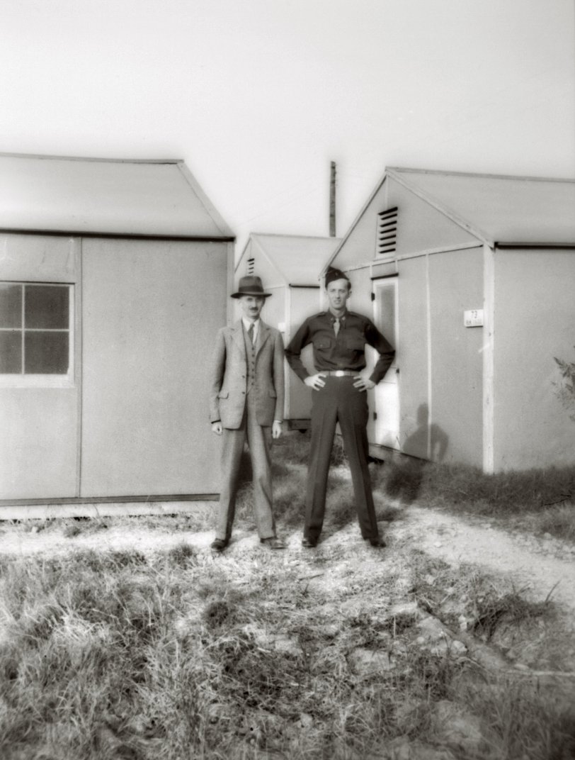 The picture is from a negative I recently found in my aunt's estate. It shows my grandfather visiting my Uncle Hermann at basic training about 1942. Granddad was a mechanical engineer who emigrated to the US from Germany in 1907. Hermann was also a mechanical engineer who returned from his service to raise a family of five. Many years later Hermann designed and patented the Jenn-Air indoor grill. View full size.
