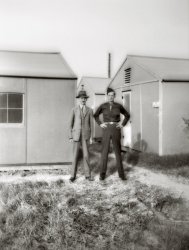 The picture is from a negative I recently found in my aunt's estate. It shows my grandfather visiting my Uncle Hermann at basic training about 1942. Granddad was a mechanical engineer who emigrated to the US from Germany in 1907. Hermann was also a mechanical engineer who returned from his service to raise a family of five. Many years later Hermann designed and patented the Jenn-Air indoor grill. View full size.