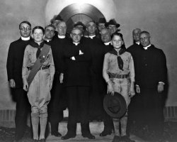 Toledo, OH, 1930s. This negative is a true puzzle.  Neither of the Scouts are related to me, nor are any of this multitude of priests.  One possability was that Granddad was taking this picture as a favor to one of the group from Blessed Sacrament Parish - or one of the boys was a neighbor - or one of the boys was someone that my aunt had a schoolgirl crush on.

I found an original print in my aunt's scrapbook from the early 1930's - and the back of the photo has no names or notes (Drat!).  
View full size.