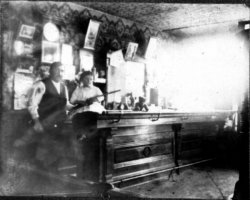 This is a picture of my great, great uncle Albert Kruspe (I think I have the greats right. He was my paternal great grandfather's brother) in the bar he owned called Kruspe's Saloon in Orland Park, IL. The bar is still there and is now known as Paddy D's. 

This picture is from the 1890's. It features my great, great uncle along with his young daughter, holding a shotgun in her lap with her teddy bear sitting on the bar. This is an awesome picture that I got from the Orland Park Historical Society. When I contacted them, the guy that received my email said he was just putting this picture up on his computer . . . the Kruspe's must have been calling me. View full size.