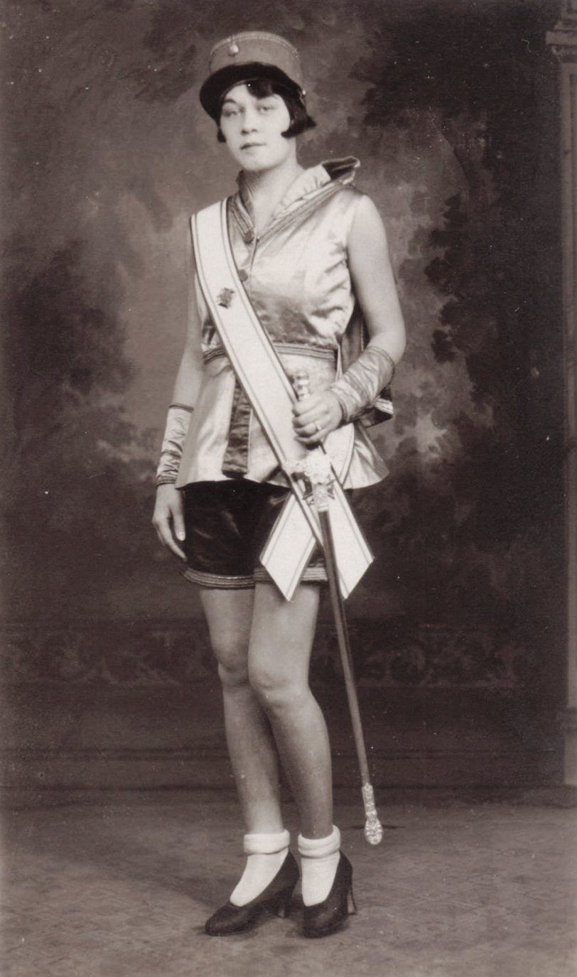 This is my Grandmother, Margie. This picture was taken in a studio in NYC sometime between 1928-1930. She was somewhere between 17 and 20 years old. My grandmother had tried out and was selected to be in the Ziegfeld Follies, but her father refused to allow her to do so. She eventually became a dancer in a Broadway production for which this picture was taken (don’t know the name of the show). This picture is actually a postcard used for advertising. I was told that the performers were given the photos on postcards to mail to all of their friends and family as a means of persuading them to “come and see the show” (not for free, of course). View full size.
