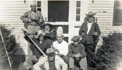 My Grandfather Gardner Ritchie (on right with gun) clowning around in Melvin Village, NH, with the Woods family of Wilmington, MA. View full size.