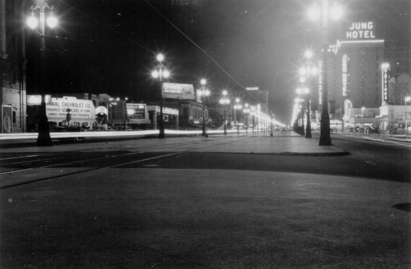 Canal Street, New Orleans, in 1941, and all of the revelers are off the street. Some to the Jung Hotel, perhaps, now closed (owned by a successor hotel chain) since Katrina. Photo taken by the father of one of my best friends. View full size.  
