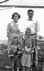 What would happen if you had zombies for parents? I think this portrait of mother, father, and the four kids, taken in the mid 1960's, tells it all. From a batch of pictures I found in a Simi Valley, California antique store. View full size.
(ShorpyBlog, Member Gallery)