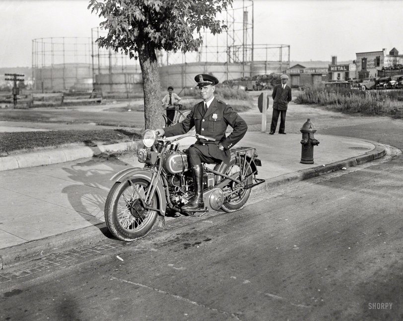 Washington, D.C., 1932. "Metropolitan police officer on motorcycle." Keeping the peace in the gashouse district. Harris &amp; Ewing glass negative. View full size.
