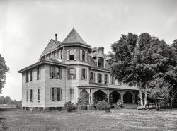 Circa 1900. "Magnolia Hotel, Pass Christian, Mississippi." 8x10 inch dry plate glass negative, Detroit Publishing Company. View full size.
BurnedBurned to the ground on April 1, 1915. Too bad, it was a beautiful building.
CroquetThe three little girls are dressed quite splendidly for what appears to be a croquet game.
(The Gallery, DPC, Kids)