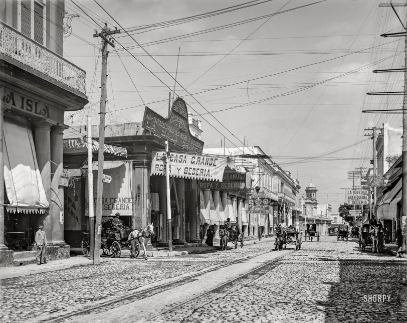 Circa 1904. "Havana, Cuba -- Calle Galleano." Where ropa y sederia beckon at The Big Store. 8x10 inch dry plate glass negative, Detroit Photographic Company. View full size.