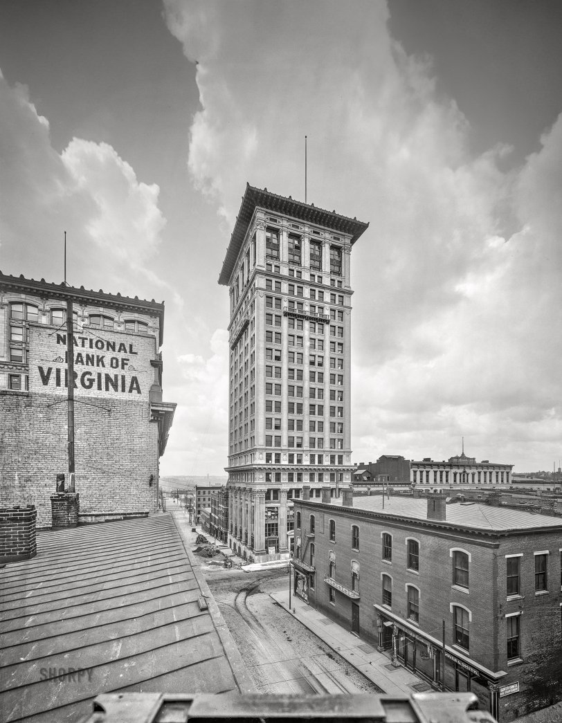 Richmond, Virginia, circa 1913. "First National Bank." Rising 262 feet at the southwest corner of Ninth and Main Streets, this 19-story building, completed in 1913, was the city's first skyscraper. 8x10 inch dry plate glass negative, Detroit Publishing Company. View full size.
