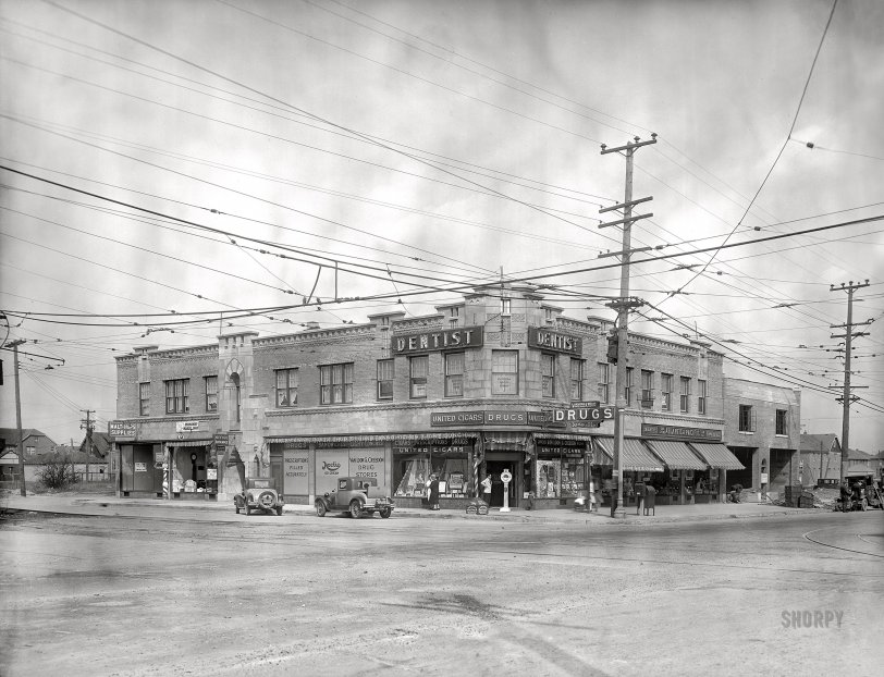 Detroit circa 1927. "Dr. Higgins, exterior bldg." At the corner of Warren Avenue and Manor Street. 8x10 inch dry plate glass negative, Detroit Publishing Company. View full size.