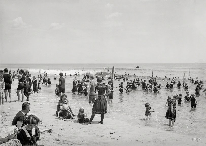 Circa 1910. "Surf bathers at beach, possibly Atlantic City." Bathing-stockings optional! 8x10 inch glass negative, Detroit Publishing Company. View full size.
