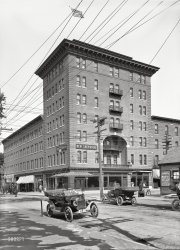 Burlington, Vermont, circa 1913. "New Sherwood Hotel, Church and Cherry Sts." Destroyed by fire in 1940. 7x5 inch dry plate glass negative. View full size.
&quot;World In Motion&quot;What a great name for an early movie theater. Would love to know more about it.  Any alternative views?
World in Motion TheaterThis site reports:
Owner: Bert M. Moran
Cap. 500, admission 5 cents and 10 cents, Mutual service.
Source: Gus Hill Directory 1914-15
Watching The Fords Go ByThree passenger cars in the photo and all are Model T's. No wonder Henry sold 15 million of them.
(The Gallery, Cars, Trucks, Buses, DPC)