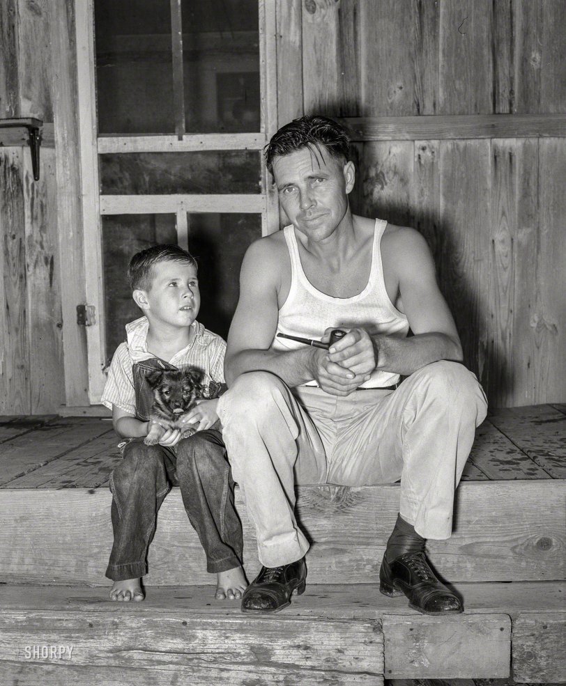 August 1939. "Oilfield truck driver and his son sitting on front porch. Seminole, Oklahoma." Happy Father's Day from Shorpy! Medium format negative by Russell Lee for the Farm Security Administration. View full size.
