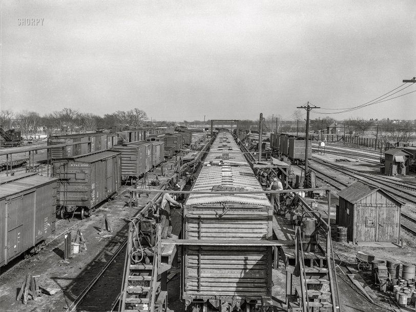 March 1943. "Topeka, Kansas. Part of the Atchison, Topeka and Santa Fe Railroad car building shops." Acetate negative by Jack Delano for the Office of War Information. View full size.
