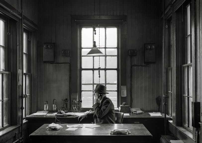 March 1943. "Fort Madison, Iowa. Mr. H.D. Tyres, yardmaster on the route of the Atchison, Topeka &amp; Santa Fe Railroad." Photo by Jack Delano, Office of War Information. View full size.
