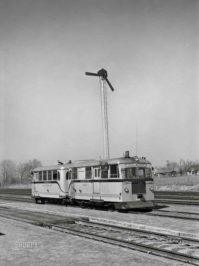 March 1943. "Kiowa, Kansas. An Atchison, Topeka &amp; Santa Fe rail detector car. These cars are actually traveling scientific instruments, which not only detect faulty rails but also record the place and extent of the defect." Photo by Jack Delano, Office of War Information. View full size.
