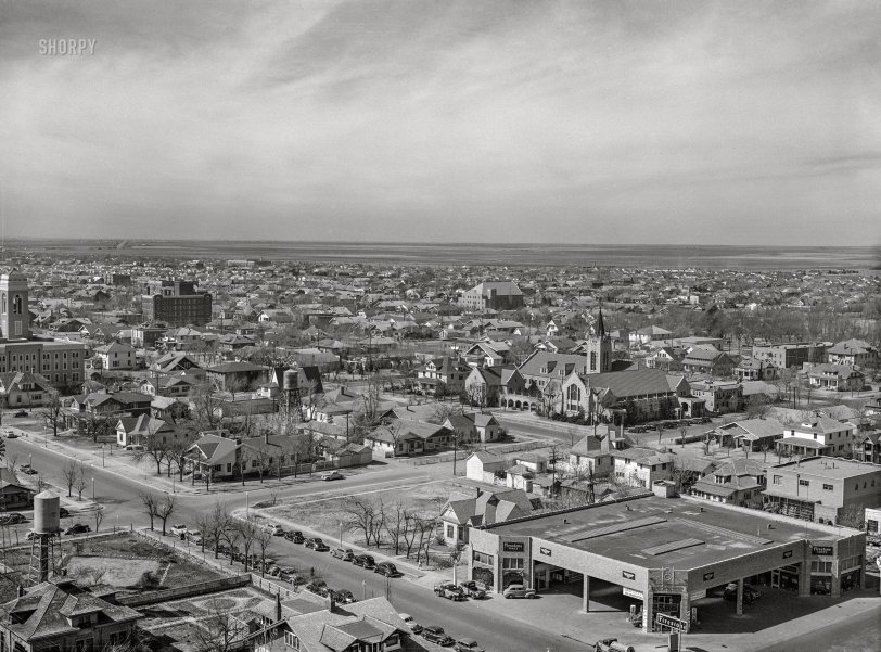 March 1943. "Amarillo, Texas. View over the city." The Firestone Tires garage on Tyler Street at 10th Avenue. Acetate negative by Jack Delano for the Office of War Information. View full size.
