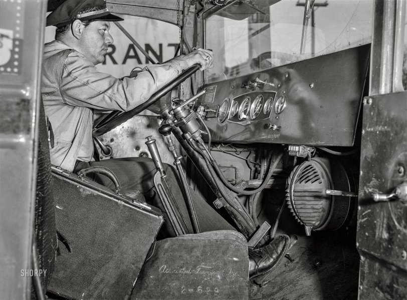 March 1943. "Bob Daugherty, a driver for the Associated Transport Company, at the wheel of a Brown truck on U.S. Highway Route 29 near Culpeper, Virginia." Medium format acetate negative by John Vachon for the Office of War Information. View full size.