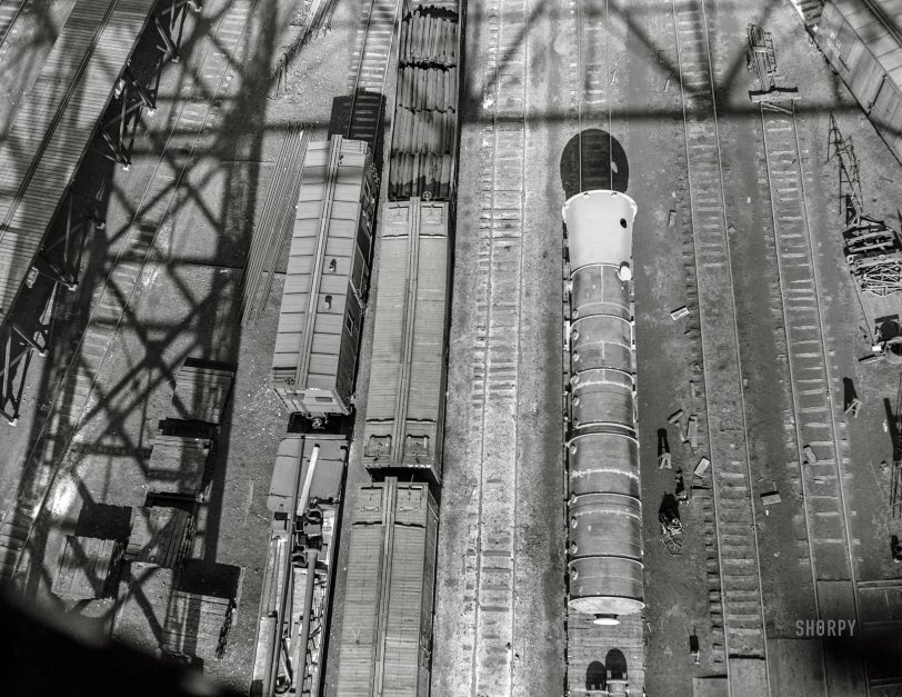 April 1943. "Detroit, Michigan. Freight cars in railyard seen from above." 4x5 inch acetate negative by Arthur Siegel for the Office of War Information. View full size.
