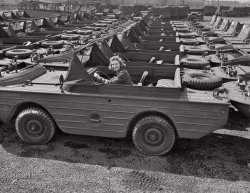 April 1943. "Detroit. Transportation of U.S. Army equipment. Amphibian jeeps waiting to be loaded on trucks." Photo by Arthur Siegel, Office of War Information. View full size.