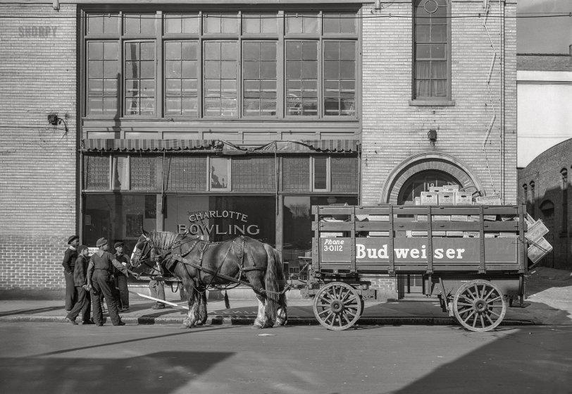 March 1943. "Charlotte, North Carolina. Beer wagon." At the Charlotte Bowling Center on West First Street. Acetate negative by John Vachon for the Office of War Information. View full size.