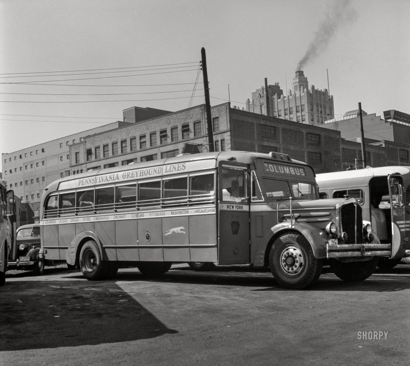 September 1943. "Columbus, Ohio. An old model bus, of the type which would ordinarily have been scrapped but is now being rebuilt because of the shortage of buses, parked in Columbus." Acetate negative by Esther Bubley for the Office of War Information. View full size.
