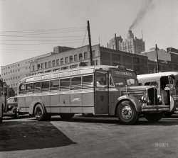 September 1943. "Columbus, Ohio. An old model bus, of the type which would ordinarily have been scrapped but is now being rebuilt because of the shortage of buses, parked in Columbus." Acetate negative by Esther Bubley for the Office of War Information. View full size.