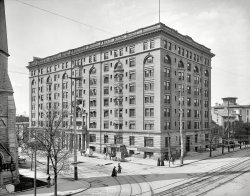 Dayton, Ohio, circa 1904. "Algonquin Hotel, Ludlow and Third." Now the Dayton Grand. 8x10 glass negative, Detroit Publishing Company. View full size.
Egg CremeWould love to pop into the drug store and have an advertised soda at the fountain.  Simple pleasures.
Roll up your pant legsIn 1913 this scene would be inundated by a flood severe enough to get its own Wikipedia entry.
Dayton Grand Hotel-DowntownStill there! 
(The Gallery, DPC)