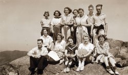 Taken in 1937, this is labeled Wesley Foundation of Grace Methodist Church, Keene, N.H. on Mt. Monadnock. My mother is the first girl seated on the left. This was the year she graduated from high school. View full size.
Nice hairGuy in the back row far right, looks like if Robert Vaughn and Gumby had a baby!!
Nice hair IIThe guy next to Vaughn/Gumby looks like the child of Andy Dick and Carrot top.
(ShorpyBlog, Member Gallery)