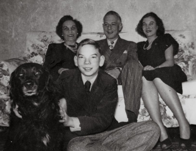 My family at home on Farrell Street in the Colonial Terraces neighborhood of Newburgh, NY, at Christmastime in 1948. In the foreground are "Blitz", the family pet dog, and myself. In the background on the couch are my parents and my older sister "Bunny." By August of the following year, my sister had married and moved to Syracuse NY where her husband was studying architecture, "Blitz" had passed away, and the rest of us had moved to Wilmington DE after my Dad had been transferred there by the duPont Company. View full size.
