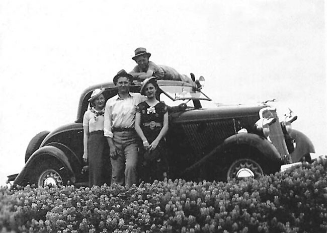 This is a picture of my grandfather (front center) and my great uncle (top of car) with a couple of their gal-pals in Corsicana, TX. I believe this is in the 30s. View full size.
