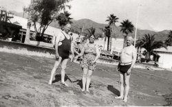 My great grandparents at the beach (my grandmother on my dad's side parents) I'm thinking sometime in the 1940's, not sure which beach (other than it's in Los Angeles County) They are the happy couple holding hands. I don't know who the other man is. View full size.