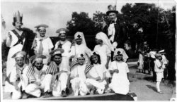 Caroline Kruspe (on left with crown) in what looks like a 4th of July Parade. View full size.