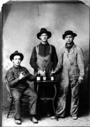 This is my paternal grandfather, Charles Kruspe (seated).  I don't know who the others are. This is from the late 1800's, probably the 1880's.  This was taken in Orland Park, IL. View full size.